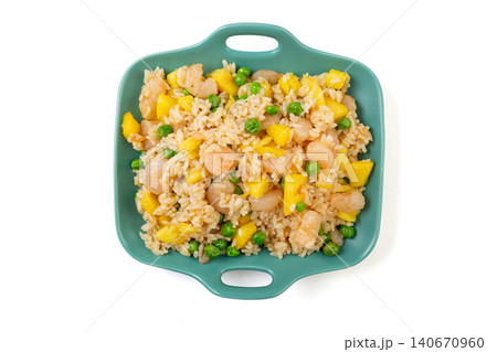 pineapple Shrimp Fried Rice with Green Peas on Green Plate pineapple Shrimp Fried Rice with Green Peas on Green Plate 140670960