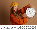 Presenting Time: Cheerful Woman in Fall Fashion Presenting Time: Cheerful Woman in Fall Fashion 140671326
