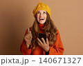 Cheerful Woman with a Bright Idea and Smartphone Cheerful Woman with a Bright Idea and Smartphone 140671327