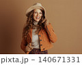Joyful Woman in Autumn Suede Jacket and Fedora Joyful Woman in Autumn Suede Jacket and Fedora 140671331