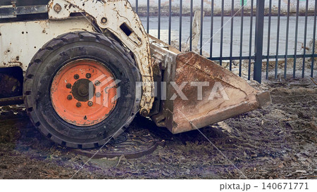 Process of leveling ground for laying an asphalt path Process of leveling ground for laying an asphalt path 140671771