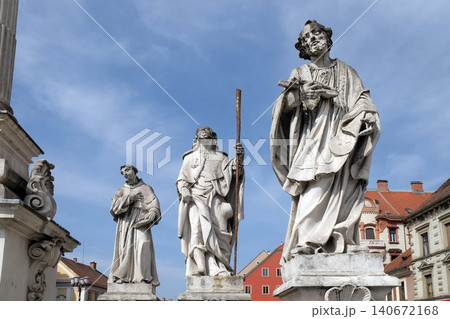 Saints Anthony of Padua, Roch and Francis Xavier statue, Plague column at Main Square of the city of Maribor in Slovenia Saints Anthony of Padua, Roch and Francis Xavier statue, Plague column at Main Square of the city of Maribor in Slovenia 140672168