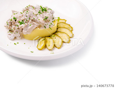 Beef stroganoff with mashed potato and pickles Beef stroganoff with mashed potato and pickles 140673778