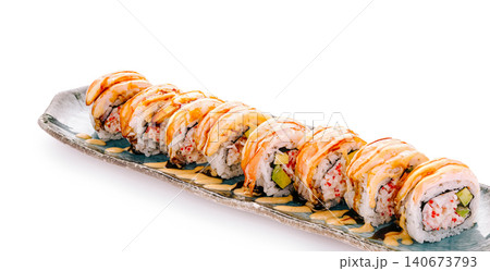 Sushi rolls with seared salmon and creamy sauce Sushi rolls with seared salmon and creamy sauce 140673793