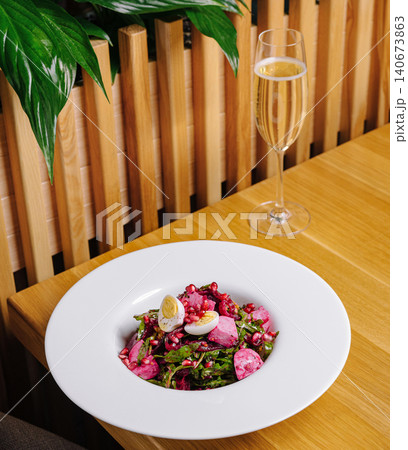 Beetroot salad with quail eggs and champagne Beetroot salad with quail eggs and champagne 140673863