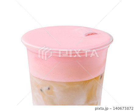 Iced coffee with pink cold foam and strawberry cream 140673872
