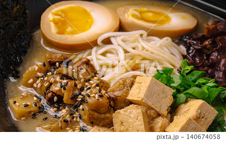 Japanese ramen noodles with soft boiled egg and tofu 140674058