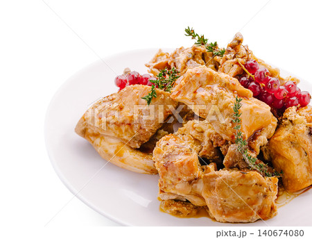 Cooked rabbit meat serving on white plate with garnish Cooked rabbit meat serving on white plate with garnish 140674080