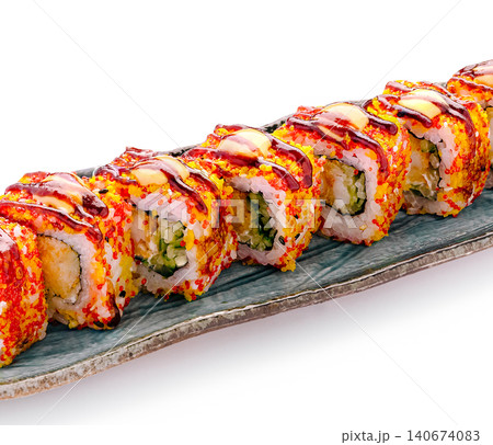 Row of sushi rolls with tobiko and sauce Row of sushi rolls with tobiko and sauce 140674083