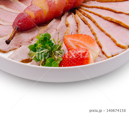 Sliced duck breast with poached pears, strawberries, microgreens Sliced duck breast with poached pears, strawberries, microgreens 140674158