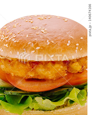 Crispy chicken burger with fresh vegetables Crispy chicken burger with fresh vegetables 140674166