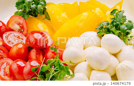 Fresh caprese salad ingredients with mozzarella, tomatoes, bell pepper Fresh caprese salad ingredients with mozzarella, tomatoes, bell pepper 140674179