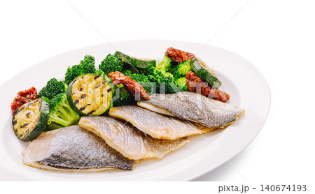 Grilled sea bass fillets with healthy vegetables plate 140674193