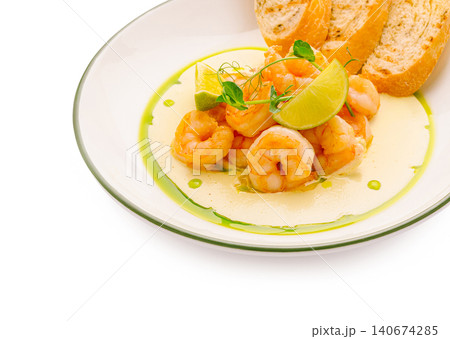 Cooked shrimp with lime, bread, and creamy sauce Cooked shrimp with lime, bread, and creamy sauce 140674285