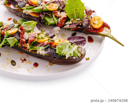Roasted eggplant salad with kumquat and sundried tomatoes Roasted eggplant salad with kumquat and sundried tomatoes 140674298