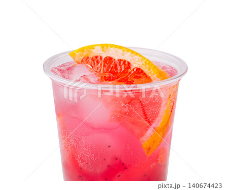 Pink grapefruit beverage in plastic cup with ice and chia seeds Pink grapefruit beverage in plastic cup with ice and chia seeds 140674423
