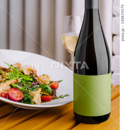 White wine bottle with blank label pairing shrimp salad White wine bottle with blank label pairing shrimp salad 140674575