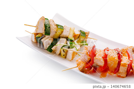 Chicken zucchini and salmon bell pepper skewers Chicken zucchini and salmon bell pepper skewers 140674658