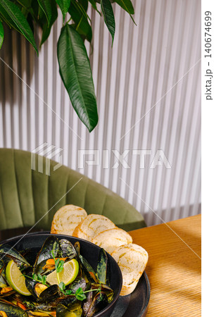 Mussels with bread and lime at restaurant Mussels with bread and lime at restaurant 140674699
