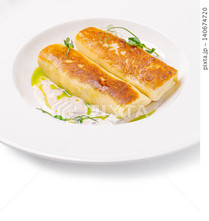 Golden fried pancakes with creamy mushroom sauce Golden fried pancakes with creamy mushroom sauce 140674720