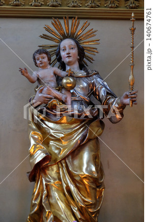 Virgin Mary with baby Jesus in parish church of St. Nicholas in Bad Ischl, Austria Virgin Mary with baby Jesus in parish church of St. Nicholas in Bad Ischl, Austria 140674761