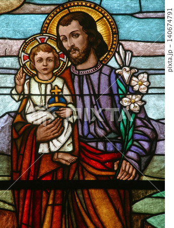 Saint Joseph holding baby Jesus 140674791