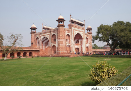Gate to the Taj Mahal (Crown of Palaces), an ivory-white marble mausoleum in Agra, Uttar Pradesh, India 140675708