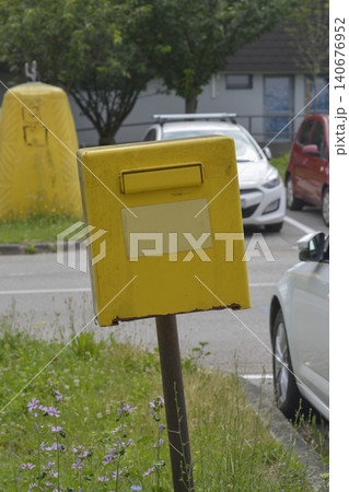 Yellow post box of Croatian Post on a street background Yellow post box of Croatian Post on a street background 140676952
