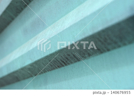 Abstract texture of turquoise ribbed concrete wall background Abstract texture of turquoise ribbed concrete wall background 140676955