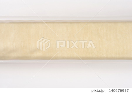 Filo Pastry Sheets Packaged in Plastic Tray Top View Filo Pastry Sheets Packaged in Plastic Tray Top View 140676957