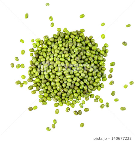 Top view of a pile of raw green mung beans isolated. Organic dried legumes used in Asian cuisine. Healthy plant-based protein source for vegetarian diets. High quality flat lay. Top view of a pile of raw green mung beans isolated. Organic dried legumes used in Asian cuisine. Healthy plant-based protein source for vegetarian diets. High quality flat lay. 140677222