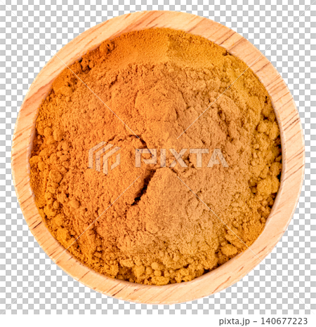 Top view of a small wooden bowl filled with aromatic turmeric powder isolated. Perfect for culinary, healthcare, and wellness content. High quality spice photography. Top view of a small wooden bowl filled with aromatic turmeric powder isolated. Perfect for culinary, healthcare, and wellness content. High quality spice photography. 140677223