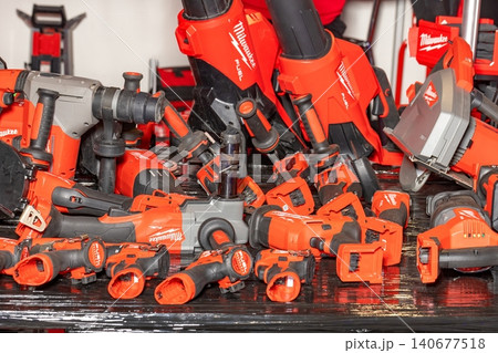 Wide collection of Milwaukee power tools displayed on a table at a trade show during the daytime. 05.14.2026. Kyiv. Ukraine Wide collection of Milwaukee power tools displayed on a table at a trade show during the daytime. 05.14.2026. Kyiv. Ukraine 140677518