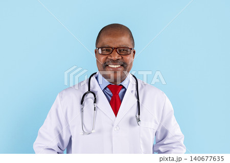 Closeup portrait of smiling mature African American doctor wearing glasses Closeup portrait of smiling mature African American doctor wearing glasses 140677635