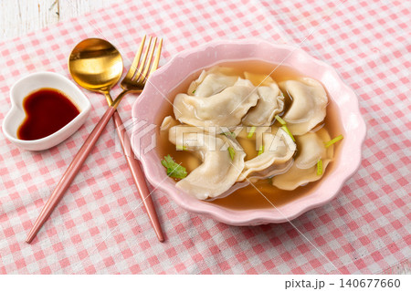 Traditional Chinese Suantang Shuijiao, Dumpling Soup with Vinegar and Chili Oil 140677660