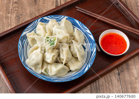Steamed Mackerel Dumplings on Plate with Dipping Sauce Steamed Mackerel Dumplings on Plate with Dipping Sauce 140677680