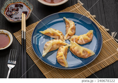 steamed Chinese Dumplings in Bamboo Steamer, Traditional Dim Sum 140678122