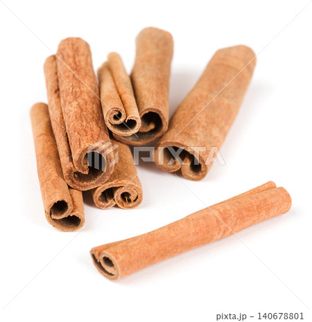 cinnamon on white background cinnamon on white background 140678801