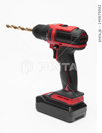 a cordless screwdriver. isolate on a white background. a cordless screwdriver. isolate on a white background. 140679982
