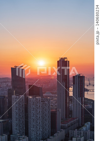 Golden sunset over the financial district of Yeouido with modern corporate skyscrapers in Seoul, South Korea 140680234