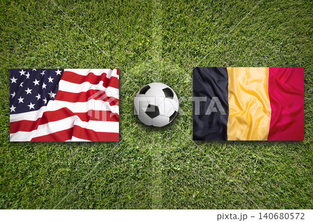 USA vs. Belgium flags on a soccer field 140680572