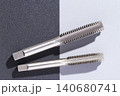 close-up image of drill bit, or tap for threads in steel 140680741