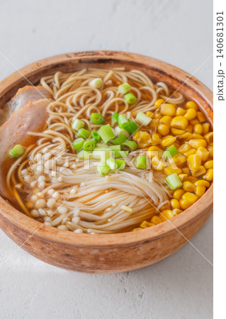Japanese Ramen Soup With Pork Belly Corn And Enoki Mushrooms 140681301