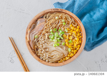 Japanese Ramen Soup With Pork Belly Corn And Enoki Mushrooms 140681304