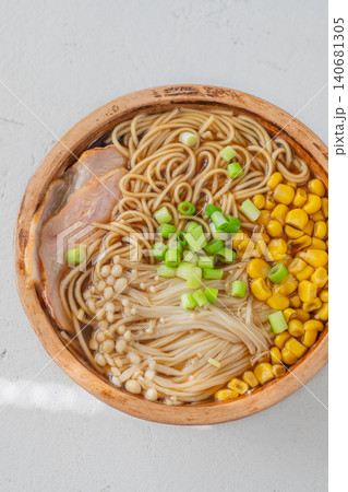 Japanese Ramen Soup With Pork Belly Corn And Enoki Mushrooms 140681305