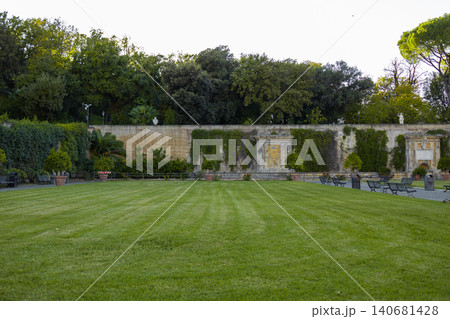 Beautiful green lawn in front of historic palace wall Beautiful green lawn in front of historic palace wall 140681428