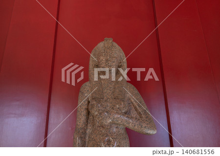 Ancient Egyptian stone statue inside historical museum exhibition Ancient Egyptian stone statue inside historical museum exhibition 140681556