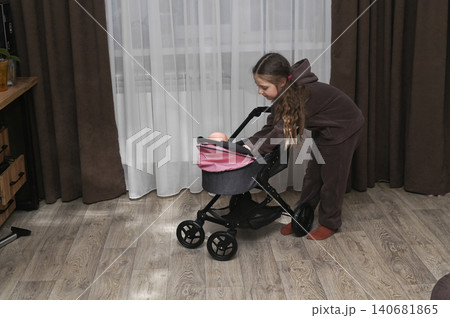 girl bending over scooter with pink cover, girl bending over scooter with pink cover, 140681865