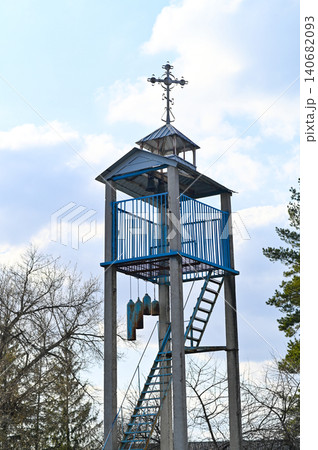 Outdoor bell tower with blue roof and metal construction, Outdoor bell tower with blue roof and metal construction, 140682093