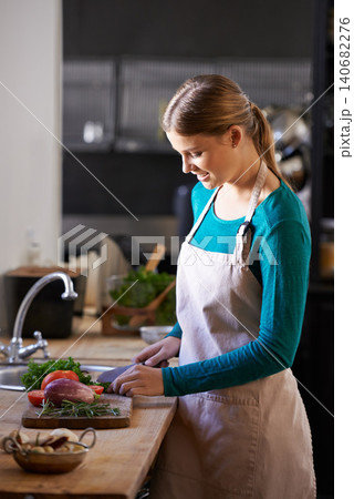 Smile, cooking and chef with vegetables in kitchen cutting ingredients with knife at home. Happy, groceries and portrait of female person with produce for dinner, supper or meal at apartment. Smile, cooking and chef with vegetables in kitchen cutting ingredients with knife at home. Happy, groceries and portrait of female person with produce for dinner, supper or meal at apartment. 140682276